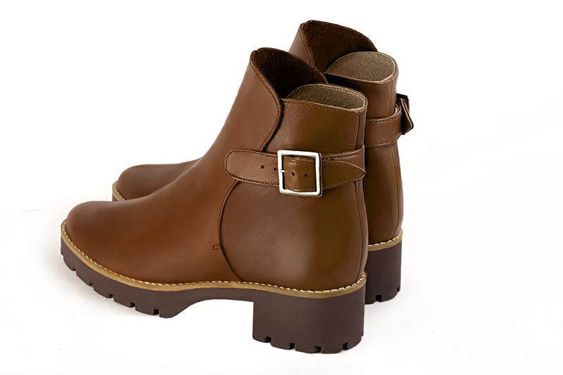 Caramel brown women's ankle boots with buckles at the back. Round toe. Low rubber soles. Rear view - Florence KOOIJMAN